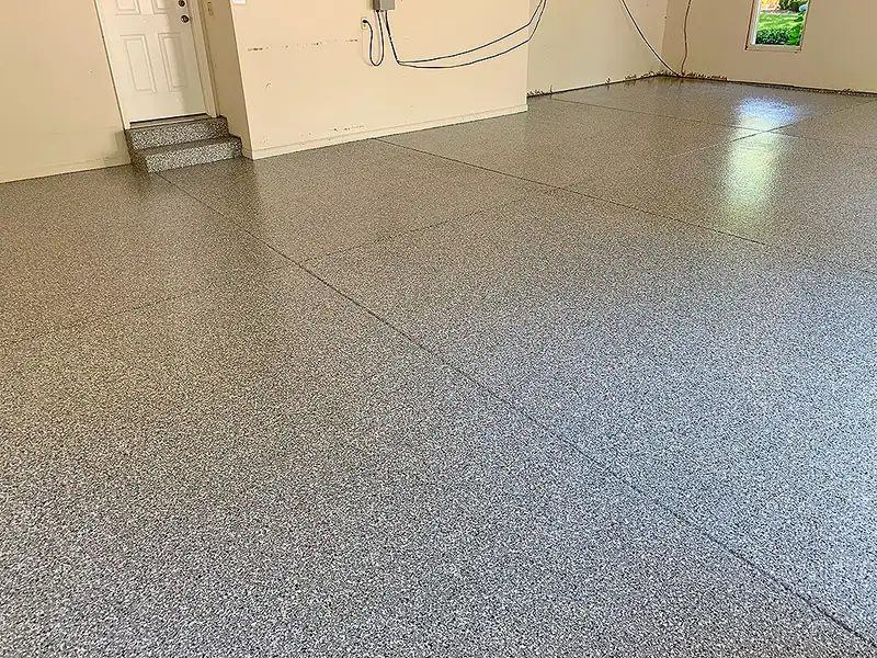 Glossy gray flake epoxy garage floor